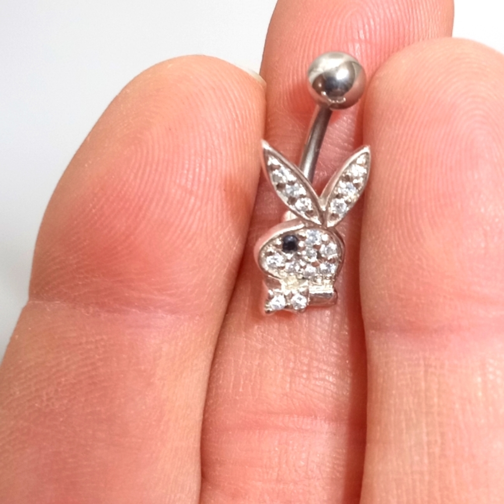 Silver and onyx playboy naval ring